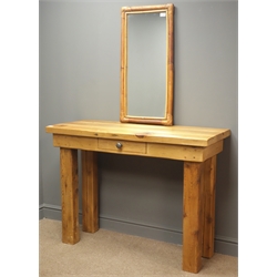  Waxed pine console table with single drawer (W116cm, H85cm, D45cm), and a rectangular bamboo framed mirror  