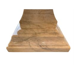 Classical Grecian design Carrera marble centre table, the rectangular single slab top with rounded corners and carved edge, raised on twin pedestals comprised of three pieces with a waisted column on a stepped plinth