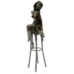 Art Deco style bronze modelled as a bare chested female figure seated upon a chair, after 'Pierre Collinet', H28cm