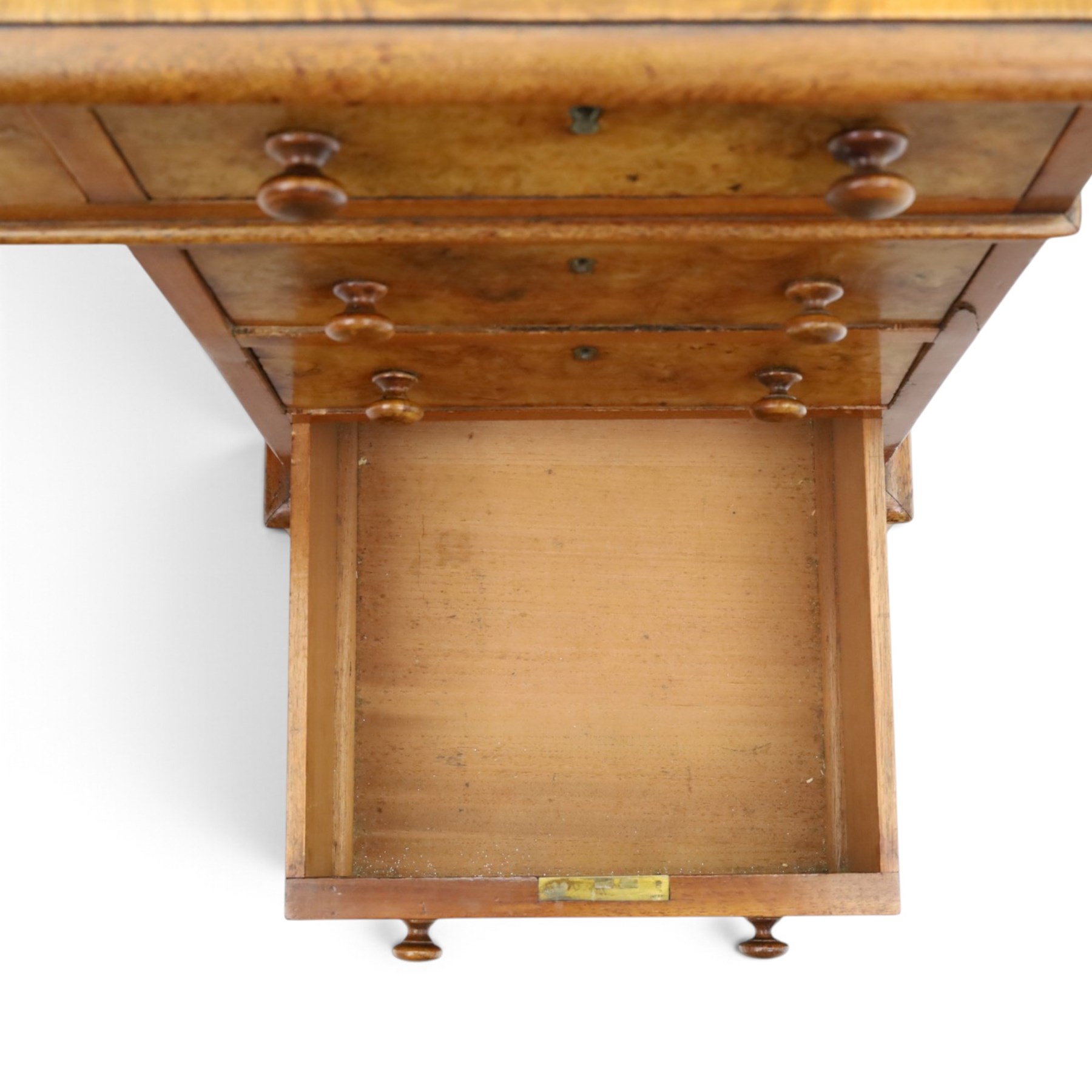 19th century burr walnut twin pedestal desk, rectangular top inset tooled green leather insert with moulded edge, frieze with three drawers with turned wooden pulls, raised on pedestal bases, containing three graduated drawers raised on plinth bases with castors