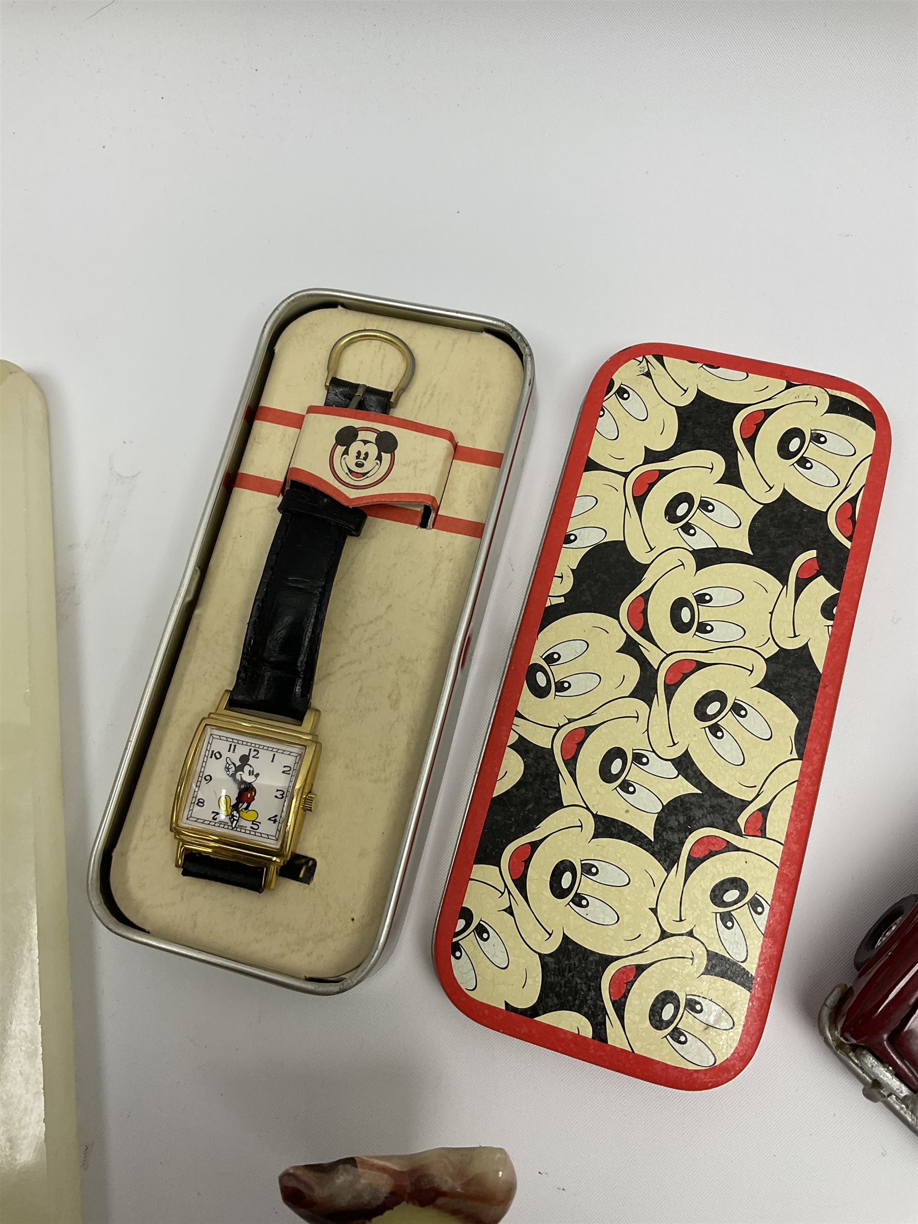 Onyx chess set, W21cm, Mickey Mouse watch in tin, Corgi Rolls Royce Corniche model, Aston Martin model and an onyx dolphin figure 