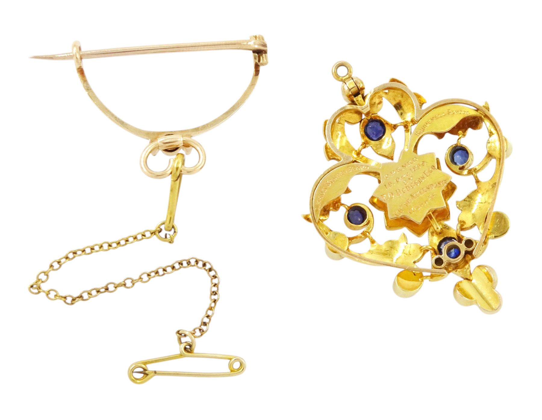 Victorian 15ct gold sapphire and split pearl pendant / brooch, the central flower head cluster set with a round cut sapphire surrounded by pearls, amongst an openwork setting set with four further sapphires and pearls, the reverse with presentation engraving and detachable brooch setting