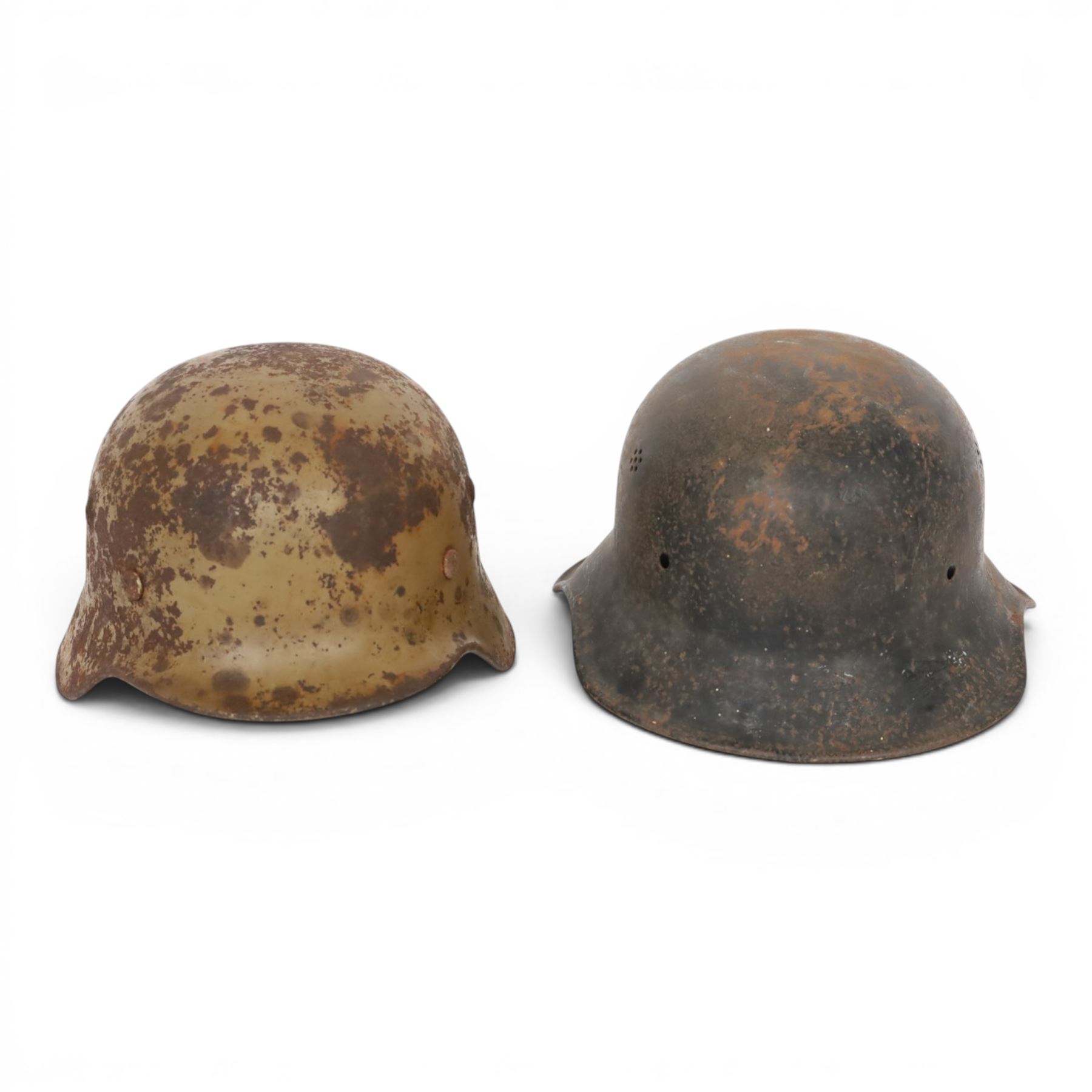WWII German Third Reich M1940 helmet, with desert camouflage, the left inner brim stamped SE64, the back inner brim stamped 506, with leather eight tongue liner, together with German M34 helmet