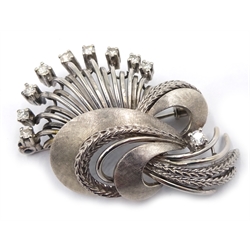  White gold contemporary flower spray brooch, set with ten diamonds tested 18ct  