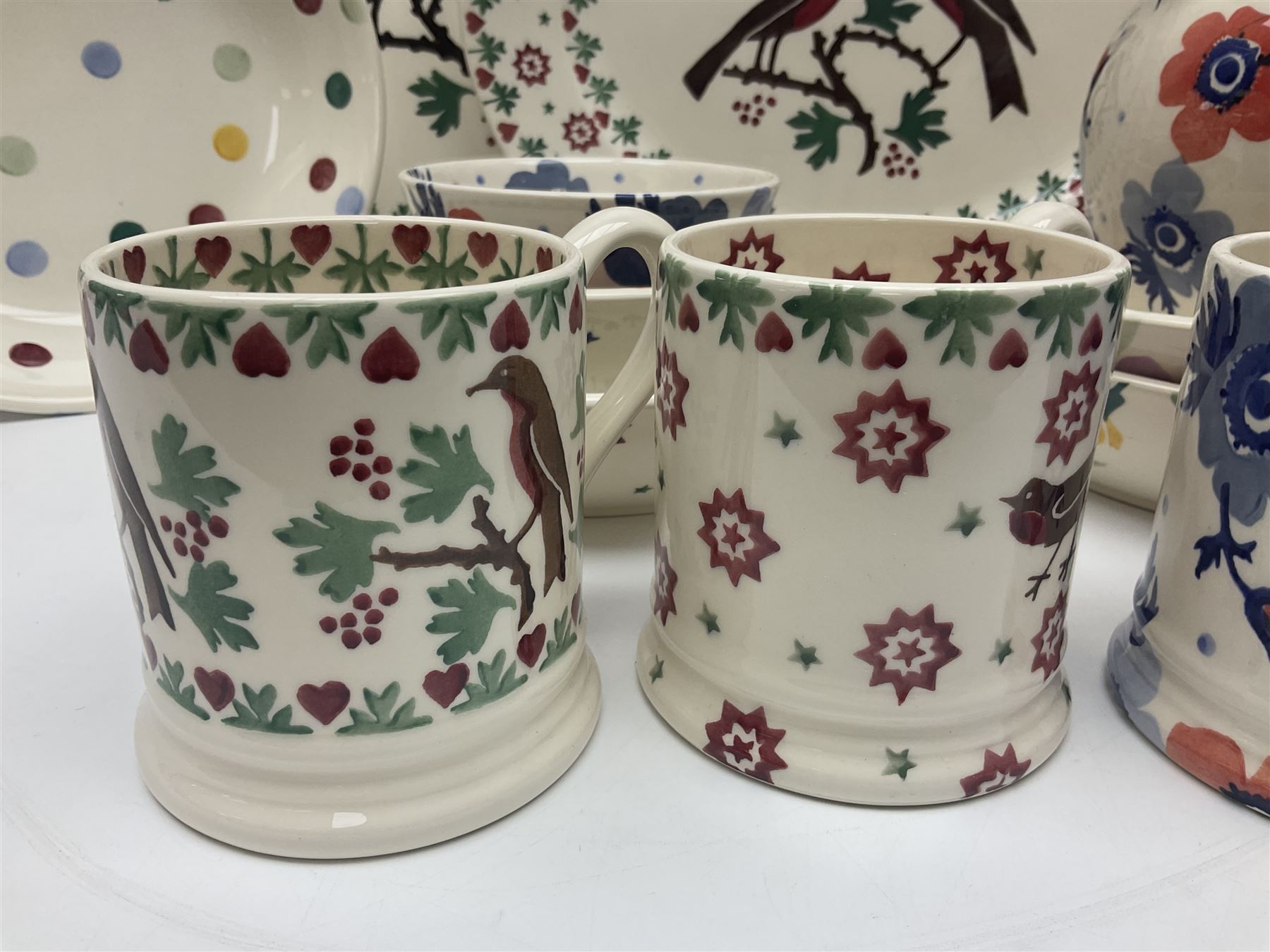 Emma Bridgewater ceramics, to include Christmas Joy Robin pattern meat platter, serving plate, bowl and two mugs, Anenome pattern jug, dinner plate, mug and three bowls, polka dot pasta bowl and two Wallflower pattern pasta bowls, largest D33.5cm