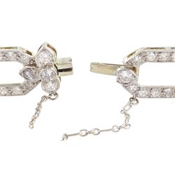 18ct white gold and platinum, milgrain set old cut diamond flower head and openwork panel link bracelet, total diamond weight approx 4.25 carat