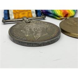 WWI pair of medals comprising British War Medal and Victory Medal awarded to G/62196 Pte. H. Ferguson R. Fus. with ribbons on wearing bar; together with bronze memorial plaque to Henry Ferguson (3)
