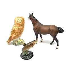 Three Beswick figures. comprising Barn Owl 1046, Trout 1390, and horse with matt brown glaze, Owl and Trout with impressed marks beneath, Horse with printed mark beneath. 