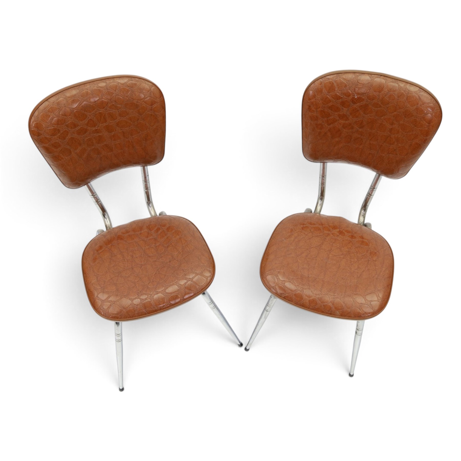 Pair of 20th century French chrome and crocodile effect bistro chairs, shaped padded back and seat upholstered in mock-croc faux leather on tapering chrome supports