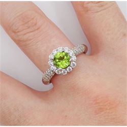 Silver peridot and cubic zirconia flower cluster ring, stamped 925