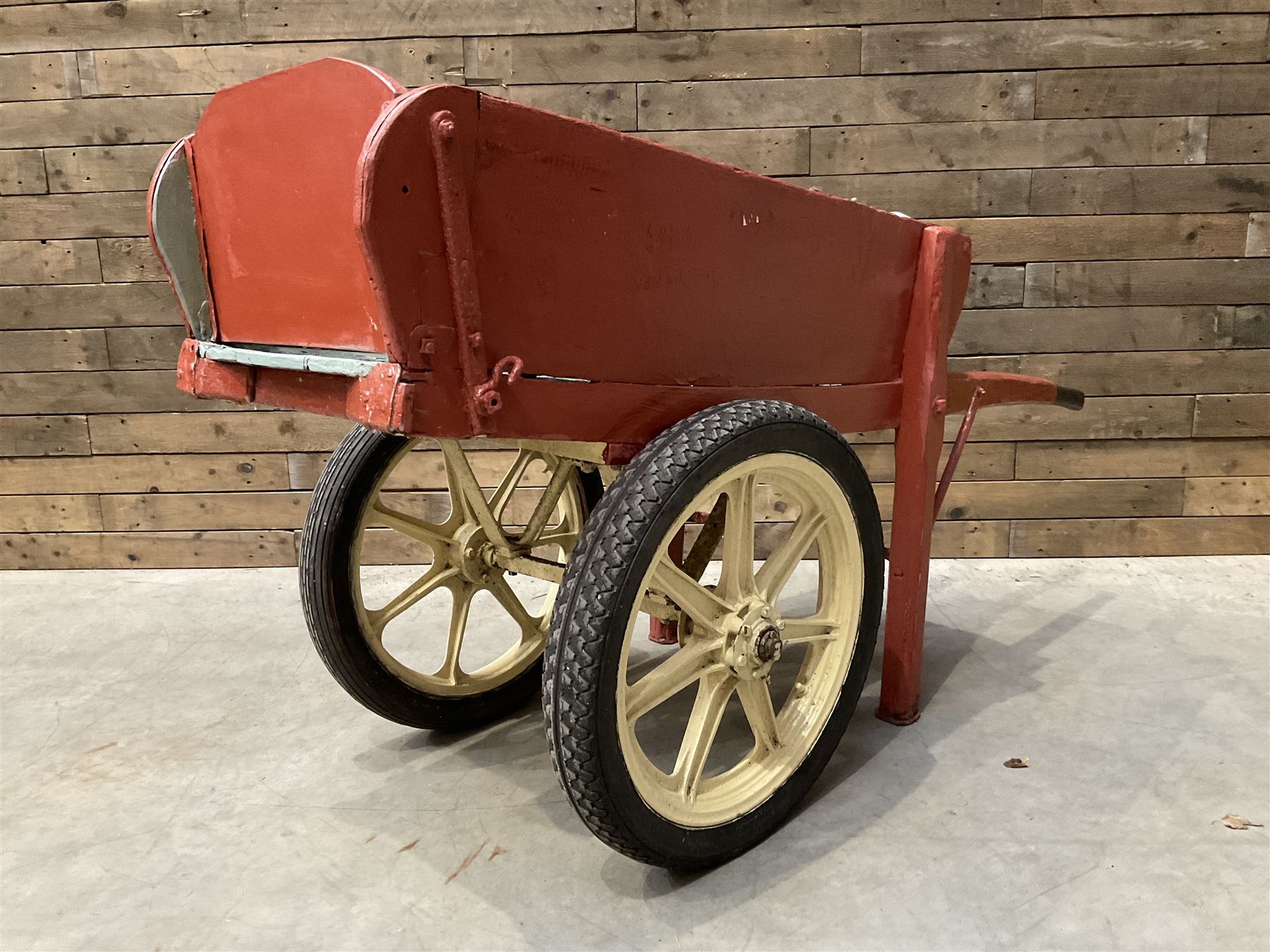 Painted timber hand cart on cast iron wheels