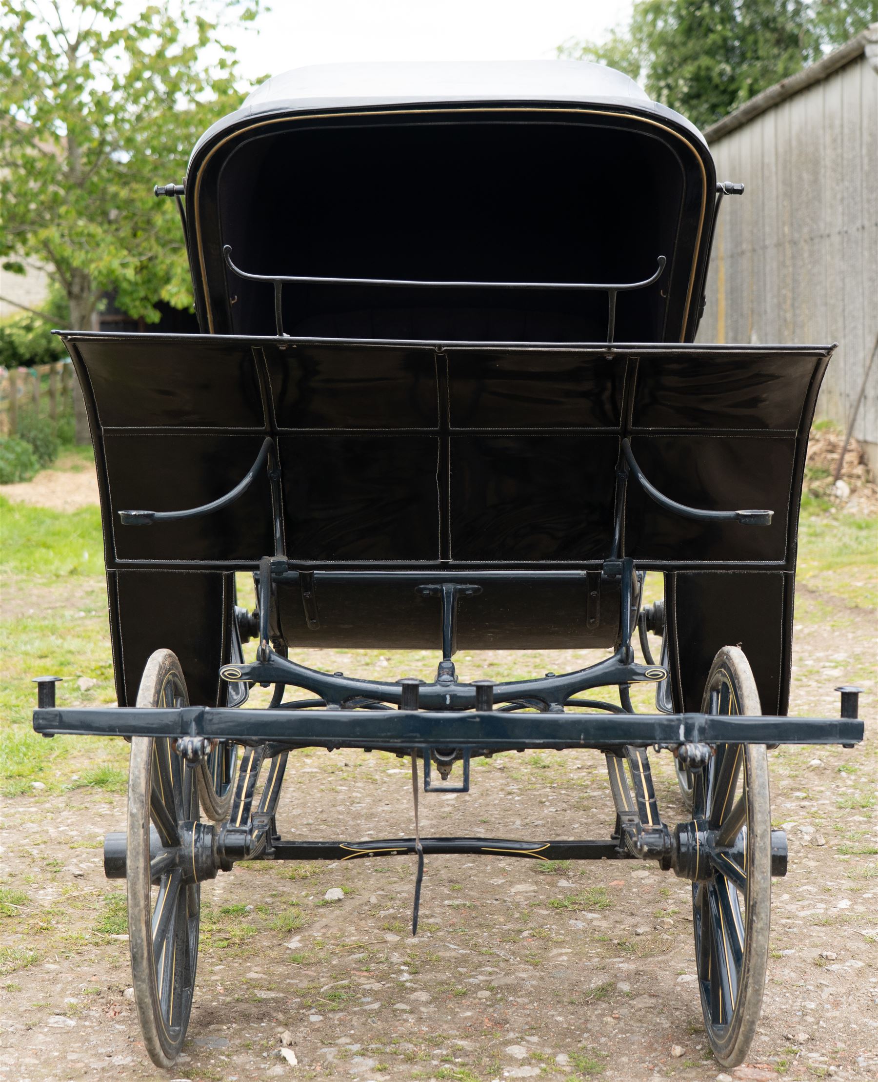 George IV Phaeton Carriage by Mills, Paddington, London

A George IV four wheeled phaeton carriage by Mills, Paddington, London, the hubs stamped accordingly, with black painted bodywork, folding black leather hood, upholstered passenger compartment and rear luggage platform. The carriage is fitted with wooden spoked wheels, yellow coachlining, leaf spring suspension, front mudguards, metal footrests and shafts for single horse use. In original condition by one of the best carriage builders of the day

Features

• Maker’s hubs marked Mills, Paddington, London
• Four wheeled phaeton carriage
• Black painted bodywork with fine yellow coachlining
• Folding black leather hood
• Button upholstered passenger seating
• Rear luggage platform with rail
• Wooden spoked wheels with rubber tyres
• Leaf spring suspension
• Shafts for single horse use
• Front mudguards and metal footrests
• Fitted with a side mounted ratchet hand brake operating on the rear wheel


Dimensions:
Overall length: 305 cm
Width: 160 cm
Height: 213 cm

Wheel Diameters:
Front wheels: 77 cm
Rear wheels: 107 cm

Seating:
Driving seats: 1
Passenger seats: 2