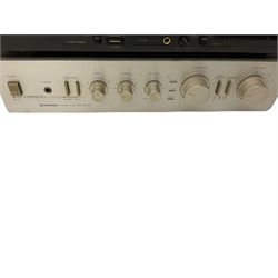 Rotel record player with pioneer amps and cassette deck with a pair of Wharfdale speakers