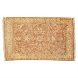 Afghan Ziegler rug, terracotta field with an all-over design of palmettes and stylized foliage in soft beige and gold tones, with a Persian Qum silk prayer rug, with a central tree of life and flowering branches and birds, within multiple floral borders, 88x125cm (2)