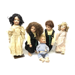 A group of five reproduction bisque head dolls, one example marked K&R to neck (Kammer and Reinhardt). 