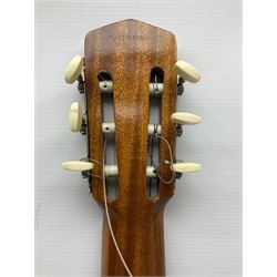 Encore black electric cut-away guitar L96cm; and Spanish Victor Garcia model 187 acoustic guitar, bears label dated 1972 L99cm; each in soft carrying case (2)