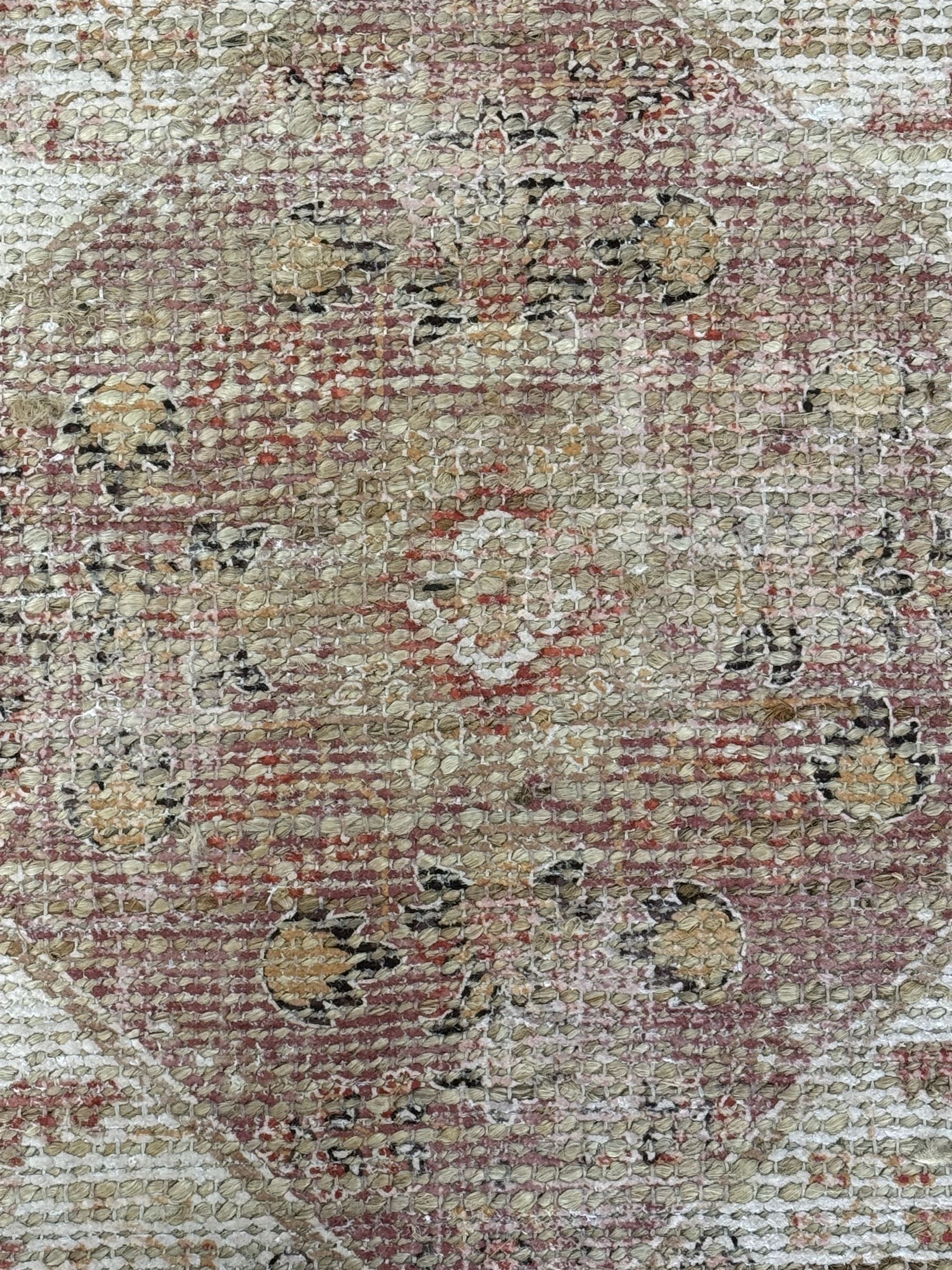 Contemporary Dunelm dua jute traditional rug, handcrafted from a blend of jute, polyester and cotton, featuring a red-toned design with a textured weave