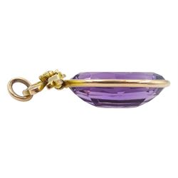 Early 20th century 10ct gold oval amethyst bow pendant 