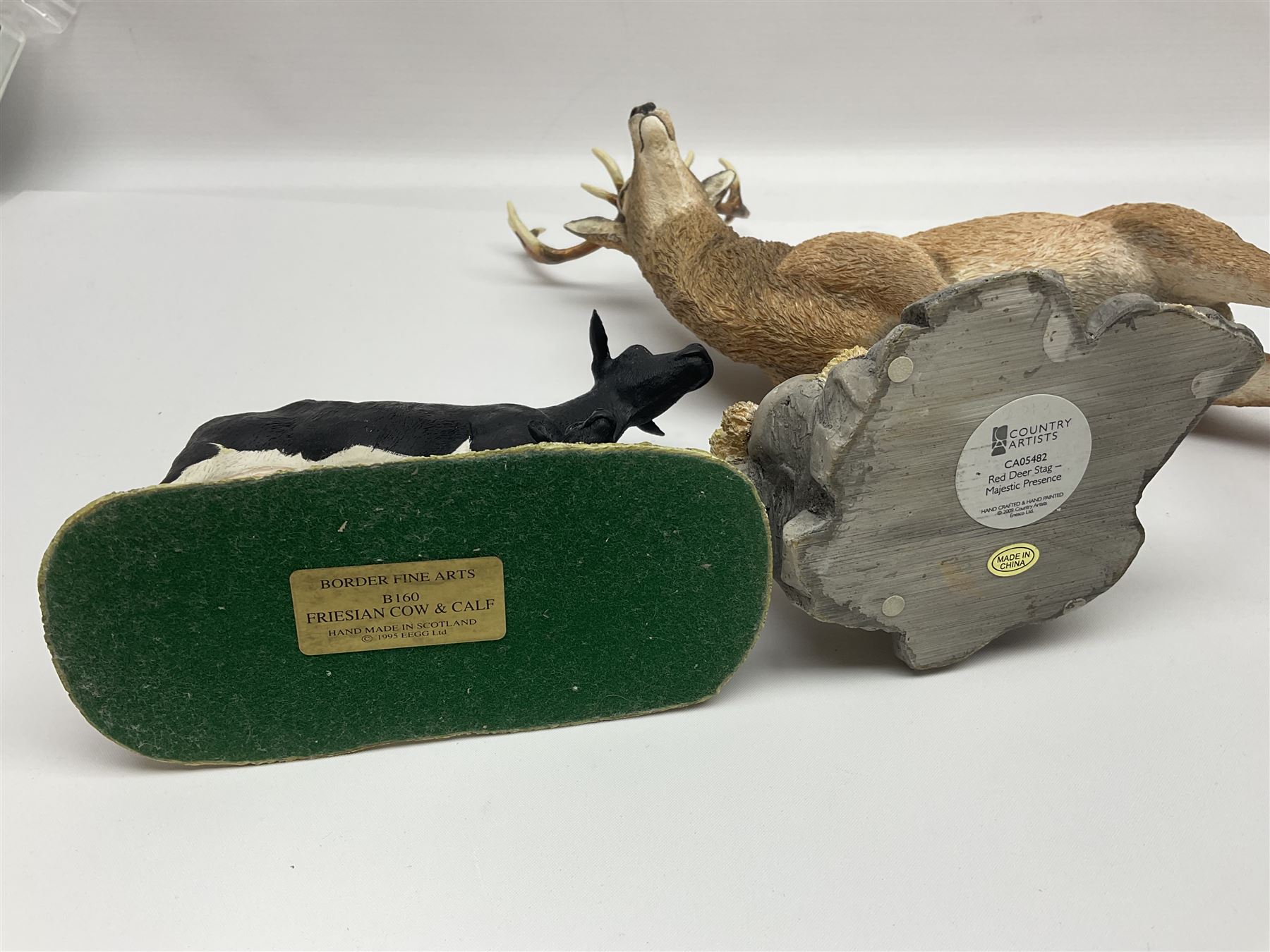 Country Artists Red Deer Stag and a Border Fine Arts Friesian Cow and Calf figure, Stag H30cm