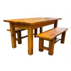 Pine dining table, rectangular plank top on square supports (181cm x 91cm, H80cm); together with two benches (133cmx 41cm, H47cm)