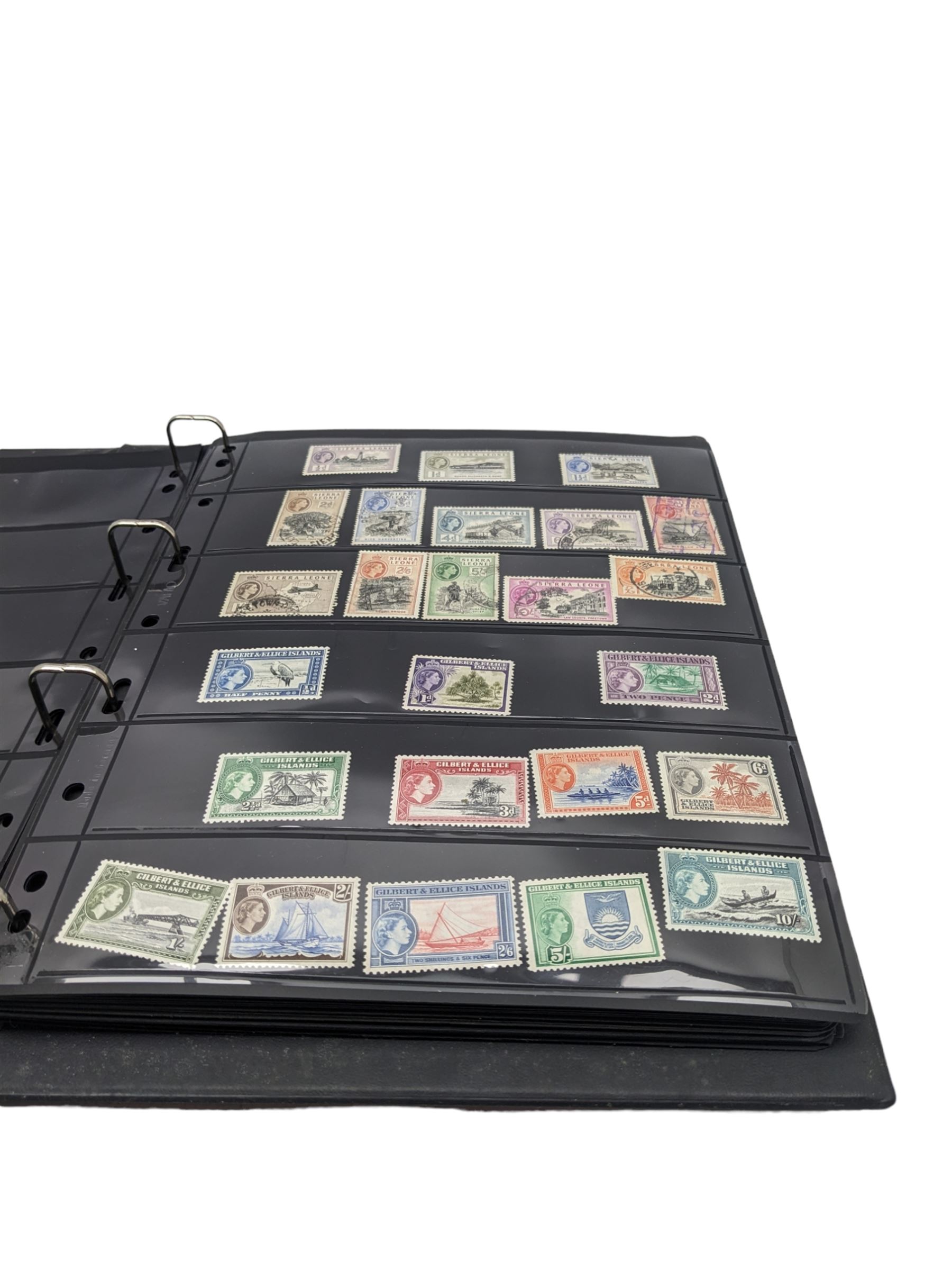 Mostly King George VI and Queen Elizabeth II Commonwealth or Empire stamps, including QEII British Solomon Islands, Pitcairn Islands, Seychelles, Sierra Leone, Mauritius, Guernsey etc, KGVI Turks and Caicos Islands, Falkland Islands Dependencies etc, mixture of mint and used values with some higher values