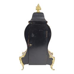 Louis XV-style gilt-bronze mounted turtleshell boulle mantel clock, the case of typical waisted form, gilt bronze foliate scroll and rocaille mounts, raised on scroll feet. Eight-day Paris movement signed “Rollin à Paris”, with outside count-wheel striking half-hourly on a single bell, the going train with anchor escapement. The circular foliate gilt bronze dial with enamelled Roman hour numerals and twin winding apertures, fitted with pierced blue steel hands and bevelled glass cover, with pendulum and key, circa 1860