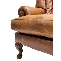 Tetrad - 'Blake' club armchair, fanned wingback and rolled arms upholstered in tan brown leather, on ball and claw carved cabriole feet 