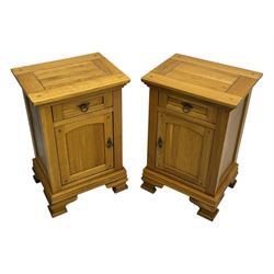 Frank Hudson - contemporary pair of light oak bedside cabinets, each with moulded rectangular top over single drawer above cupboard door with arched panel, on a moulded plinth base with bracket feet