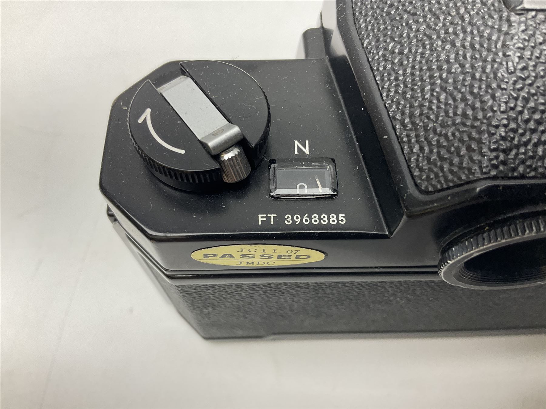 Nikkormat FT2 camera body, serial no. 5066813, in original packaging, together with Nikkormat EL camera body, serial no. 5577358, with Nikon Nikkor 50mm 1:1.8' lens no. 2143575, Nikkormat FT, serial no. 3968385, and Nikomat FT camera body, serial no. 4015491