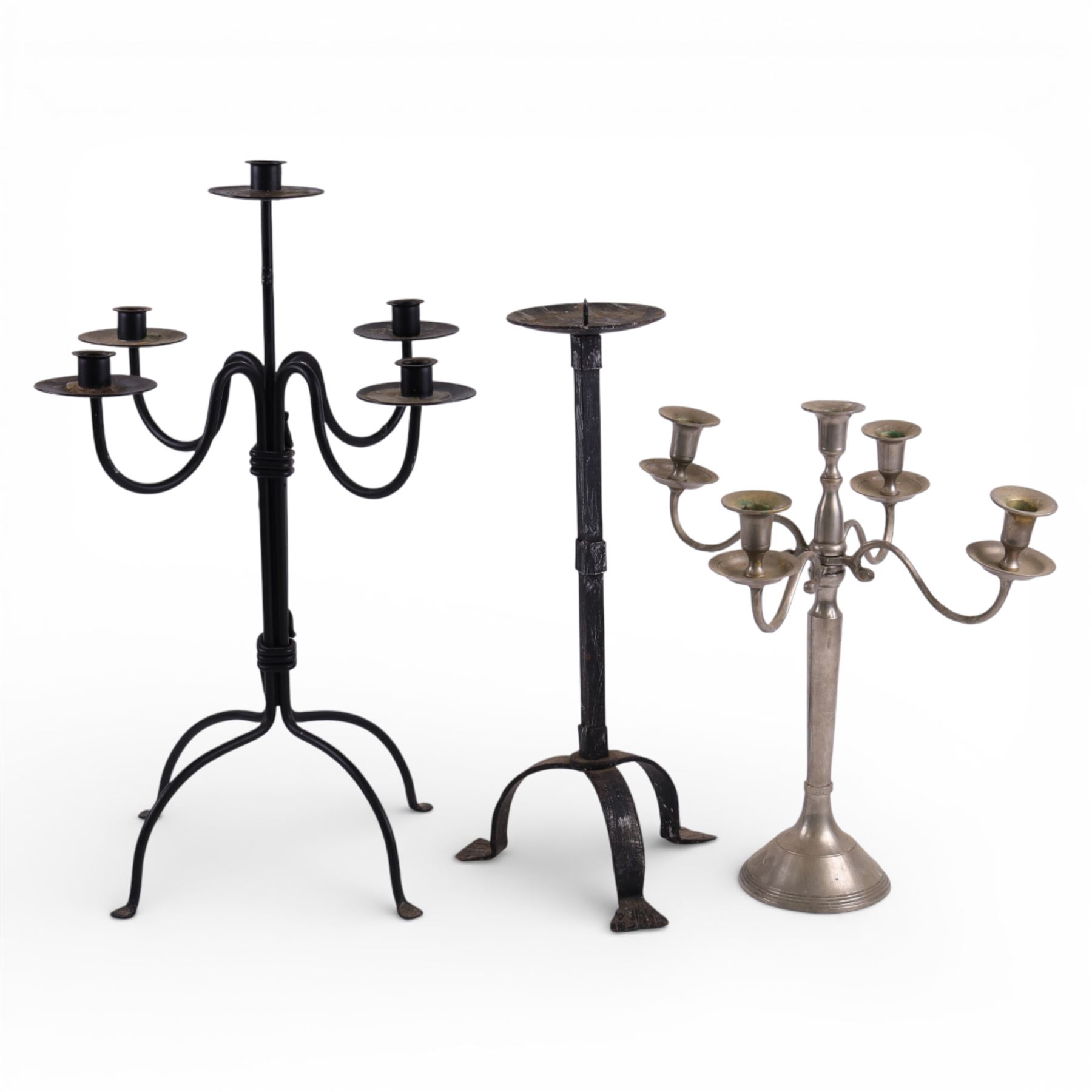Black metal four branch candelabra, H56.5cm, together with a wrought iron style picket candlestick upon three feet, H45.5cm, and a further four branch example, H39cm