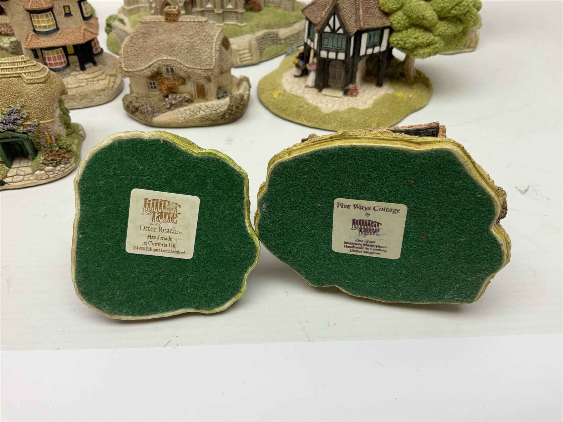 Twelve Lilliput Lanes, including Old Shop Bignor, Dial Cottage, Paradise Lodge, etc, some with deeds and original boxes