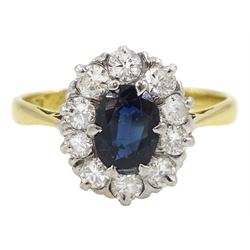 18ct gold oval sapphire and round brilliant cut diamond cluster ring, stamped  18ct Plat, total diamond weight approx 0.55 carat