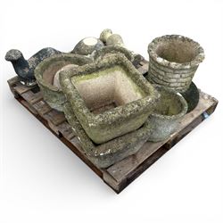 Collection of various cast stone planters and other stone items