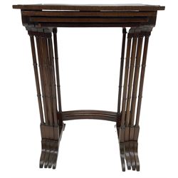 20th century inlaid mahogany quartetto nest of four tables, rectangular top inlaid with birdseye maple oval panel, ring turned supports on sledge feet