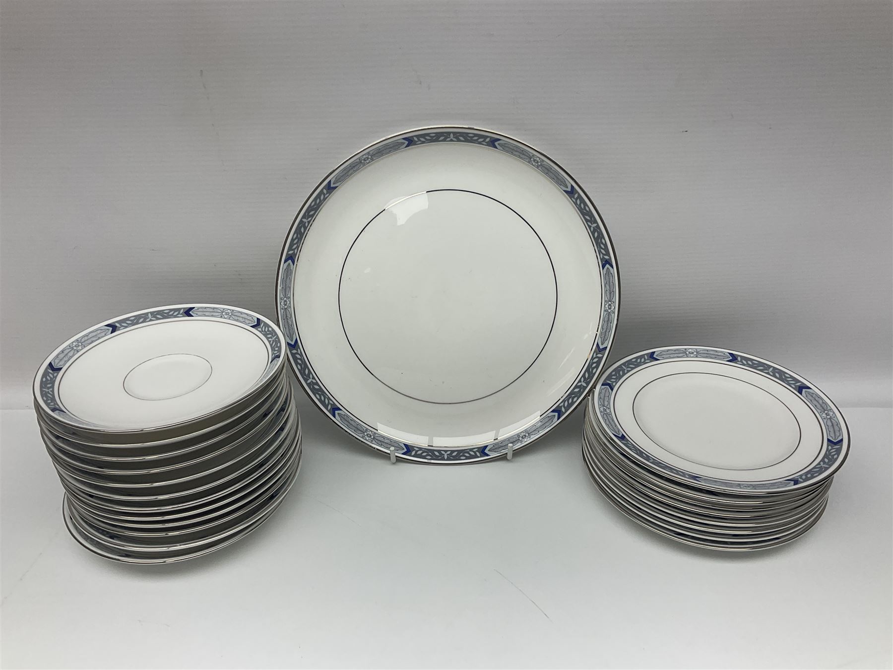 Royal Worcester Beaufort tea service, comprising teapot, milk jug, open saucier, eleven teacups, twelve saucers, eight dessert plates and one cake plate