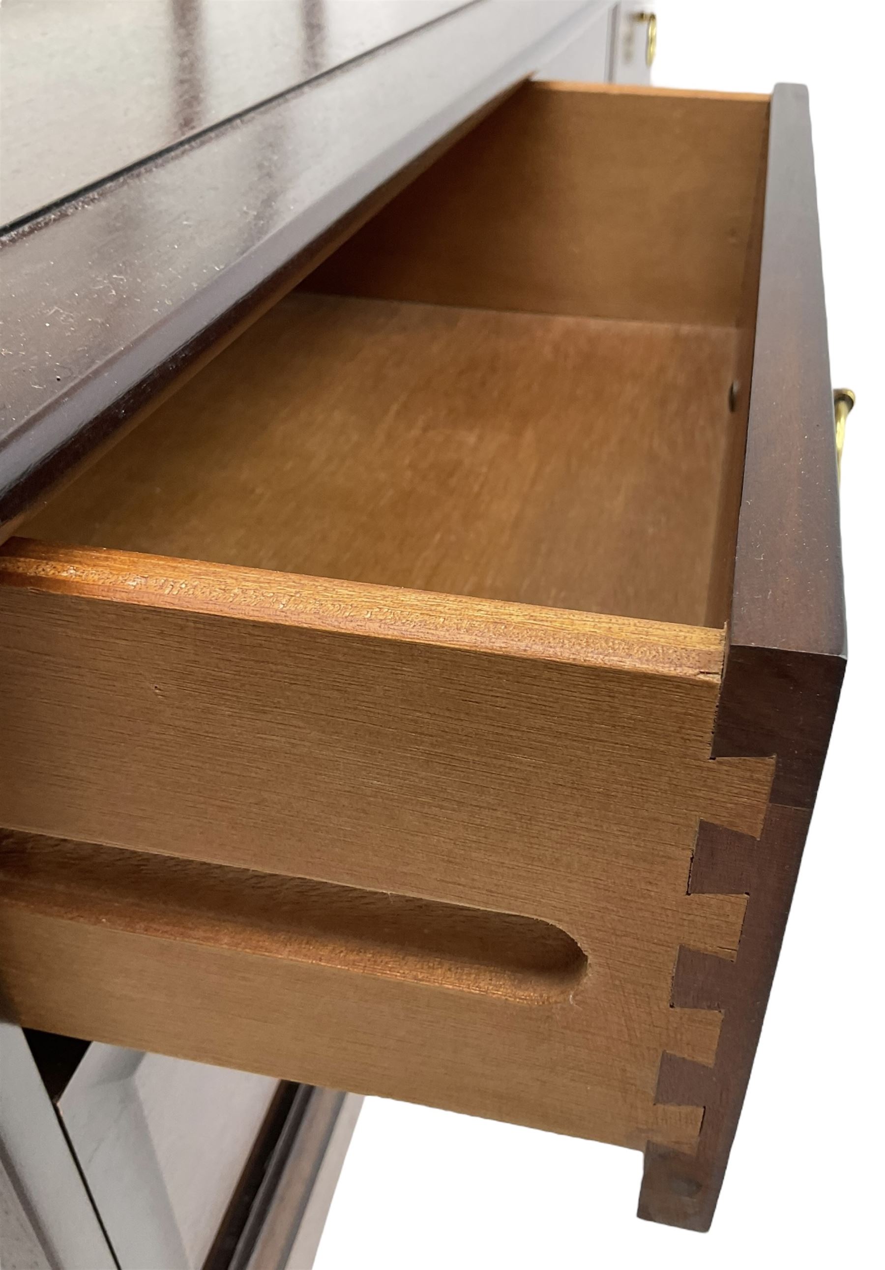Stag Minstrel - triple mirror back dressing table, fitted with six drawers