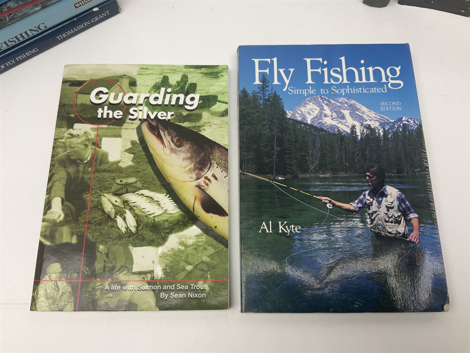 Collection of eighteen books on fly fishing including Child of