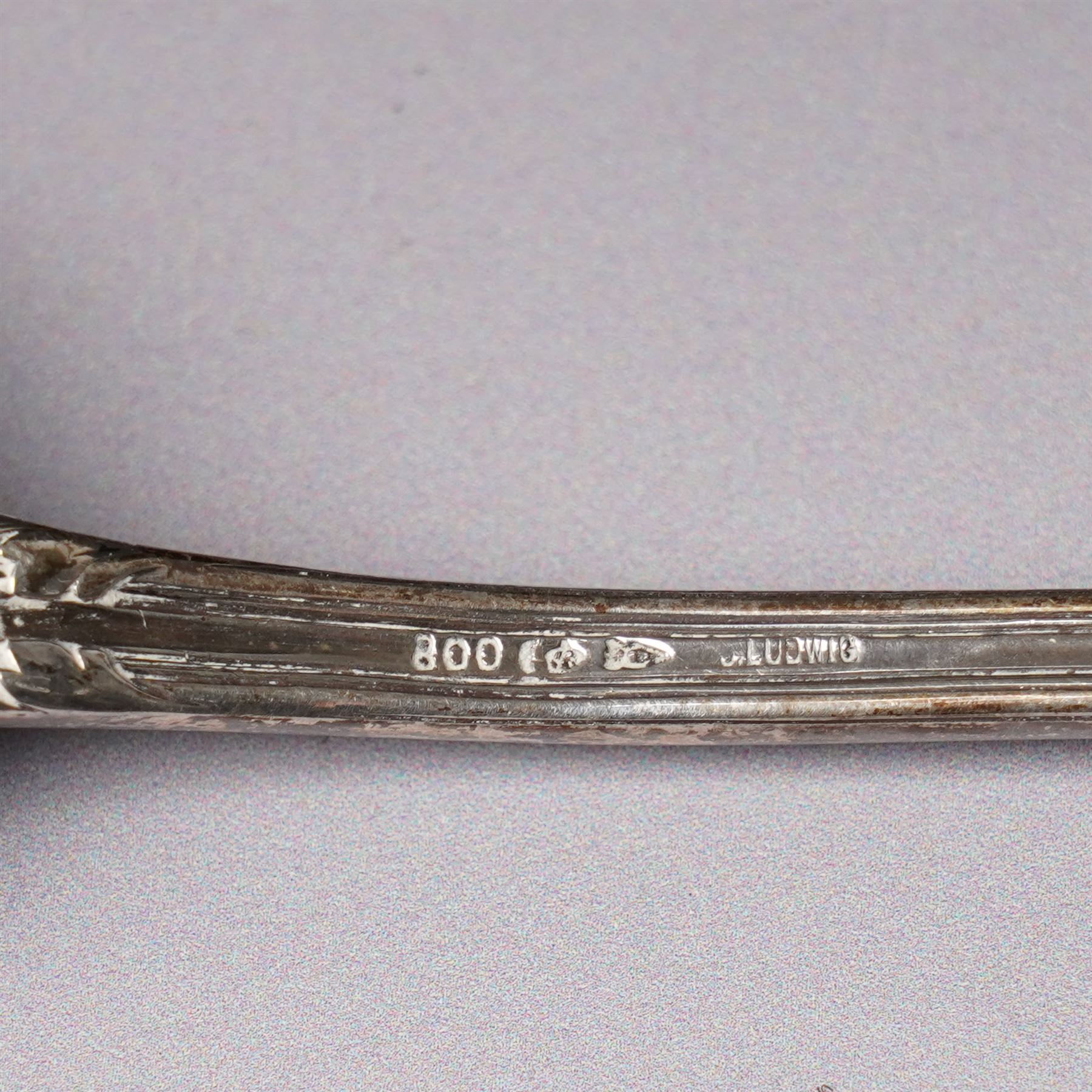 Five George IV Scottish silver table forks engraved with initial Glasgow 1829 Maker G Thomson, one German silver (800) spoon and five silver serviette rings
