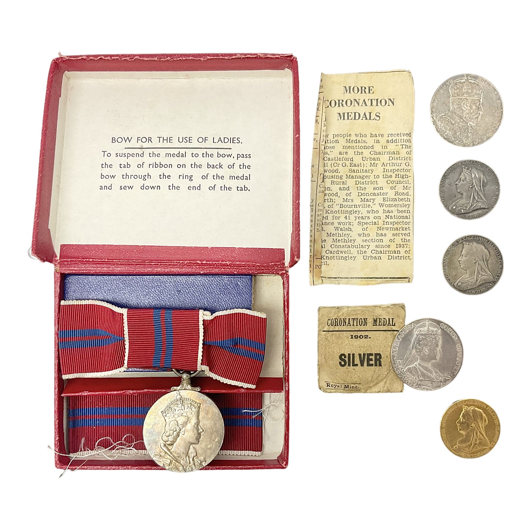 Commemorative medallions or medals including three Queen Victoria Diamond Jubilee small silver medallions, two King Edward VII 1902 Coronation medallions and a Queen Elizabeth II 1953 Coronation medal in red box