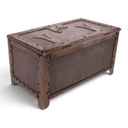 Late 19th/early 20th century vernacular iron box, the hinged cover and sides with applied strapwork decoration, the cover with applied church motif, H11.5cm W22cm D12cm