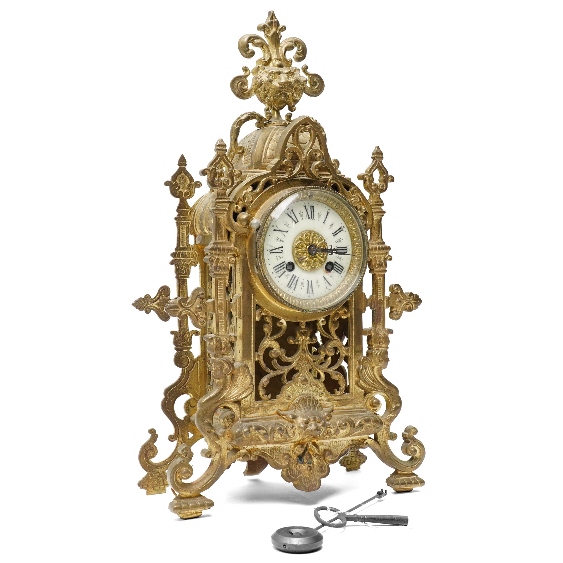 Early 20th century brass mantle clock with white dial and bell strike H42cm