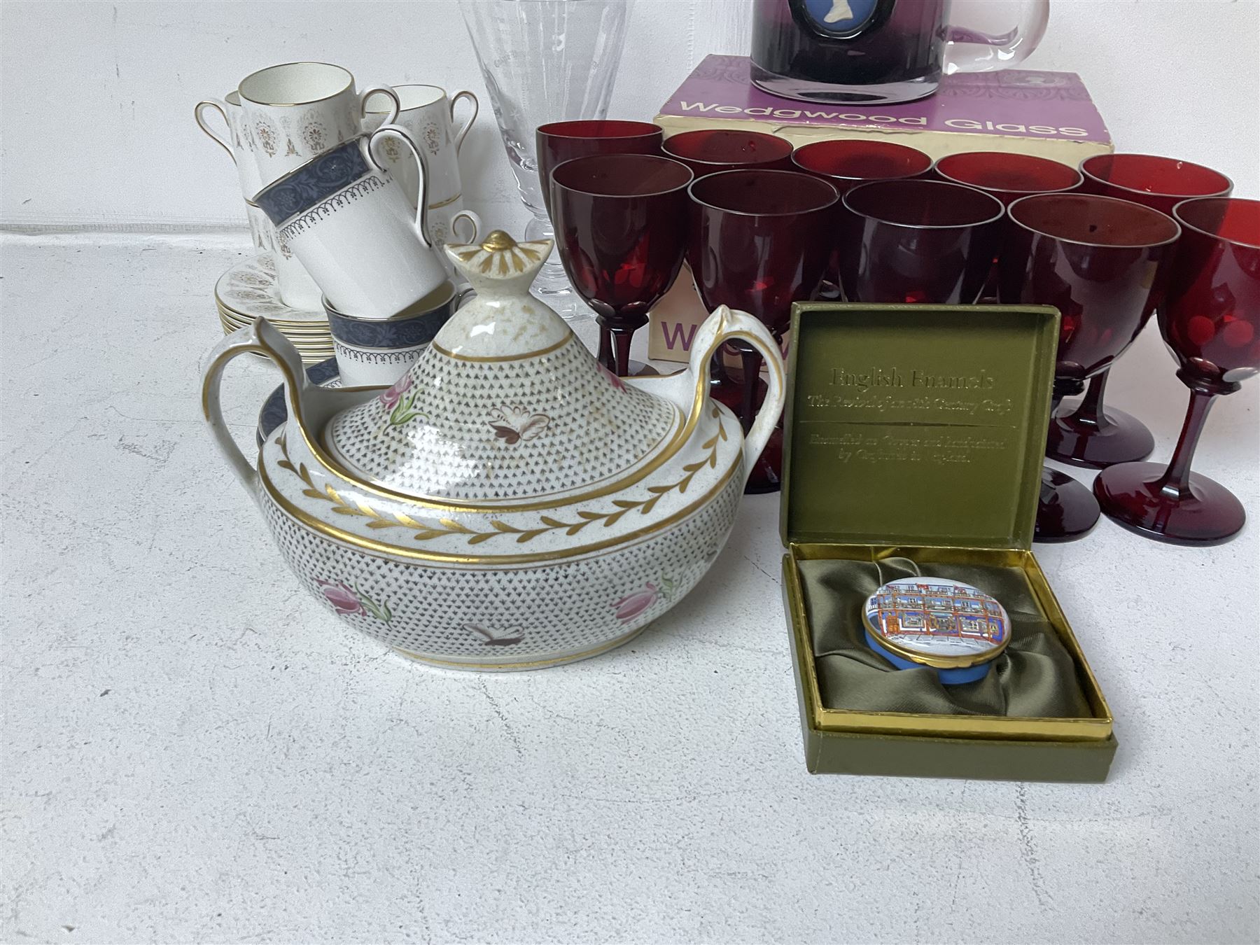 Twin handled sucrier with cover, in the manner of Thomas Grainger for Royal Worcester, together with Wedgwood Medina pattern coffee cans and saucers, a set of ten ruby glasses and a Wedgwood cameo glass tankard etc