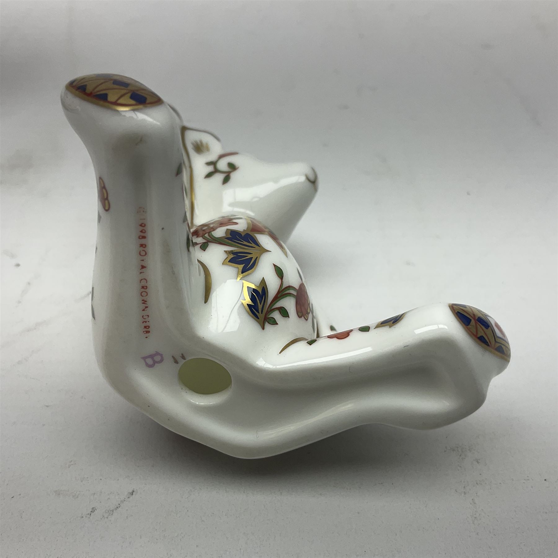 Royal Crown Derby Treasures of Childhood cabaret set, comprising tray, milk jug, sucrier, teacup and saucer, together with two Royal Crown Derby Treasures of Childhood paperweights Fleur and Ragdoll Sailor and Teddy bear paperweight, all paperweights are without stoppers