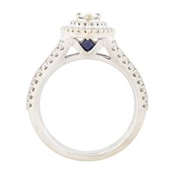 Vera Wang 18ct white gold diamond and sapphire 'Love' ring, single pear cut diamond, surrounded by two rows of round brilliant cut diamonds, split diamond set shoulders and sapphire set gallery, hallmarked, total diamond weight 0.95 carat