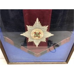  A framed Irish Guards music stand banner with woven badge 61cm x 59cm, an Irish Guards Sergeants Mess pennant with woven badge by Mayfield Jays H25cm and another with printed badge (3)  