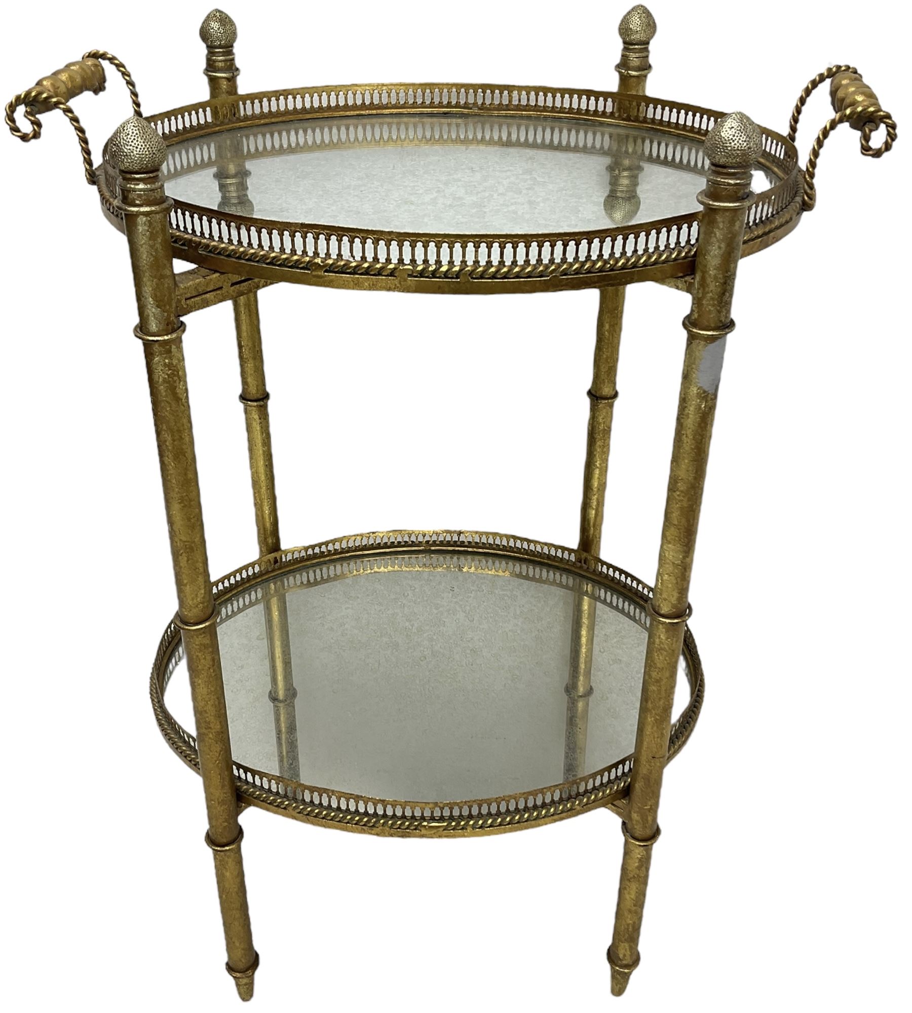Gilt metal oval stand, two mirrored tray tiers with raised pierced galleries
