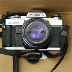 Kodak vest Pocket Hawk-Eye camera, Minolta X-300 camera, Tokina lens and other items
