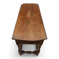 Early 19th century oak drop-leaf gateleg table, oval top above plain frieze, on ring turned legs joined by stretchers