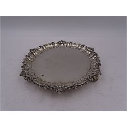 Victorian silver waiter, of typical form, with shaped rim embossed with C scrolls, upon three scroll feet, hallmarked Sibray, Hall & Co, London 1898, D18.5cm
