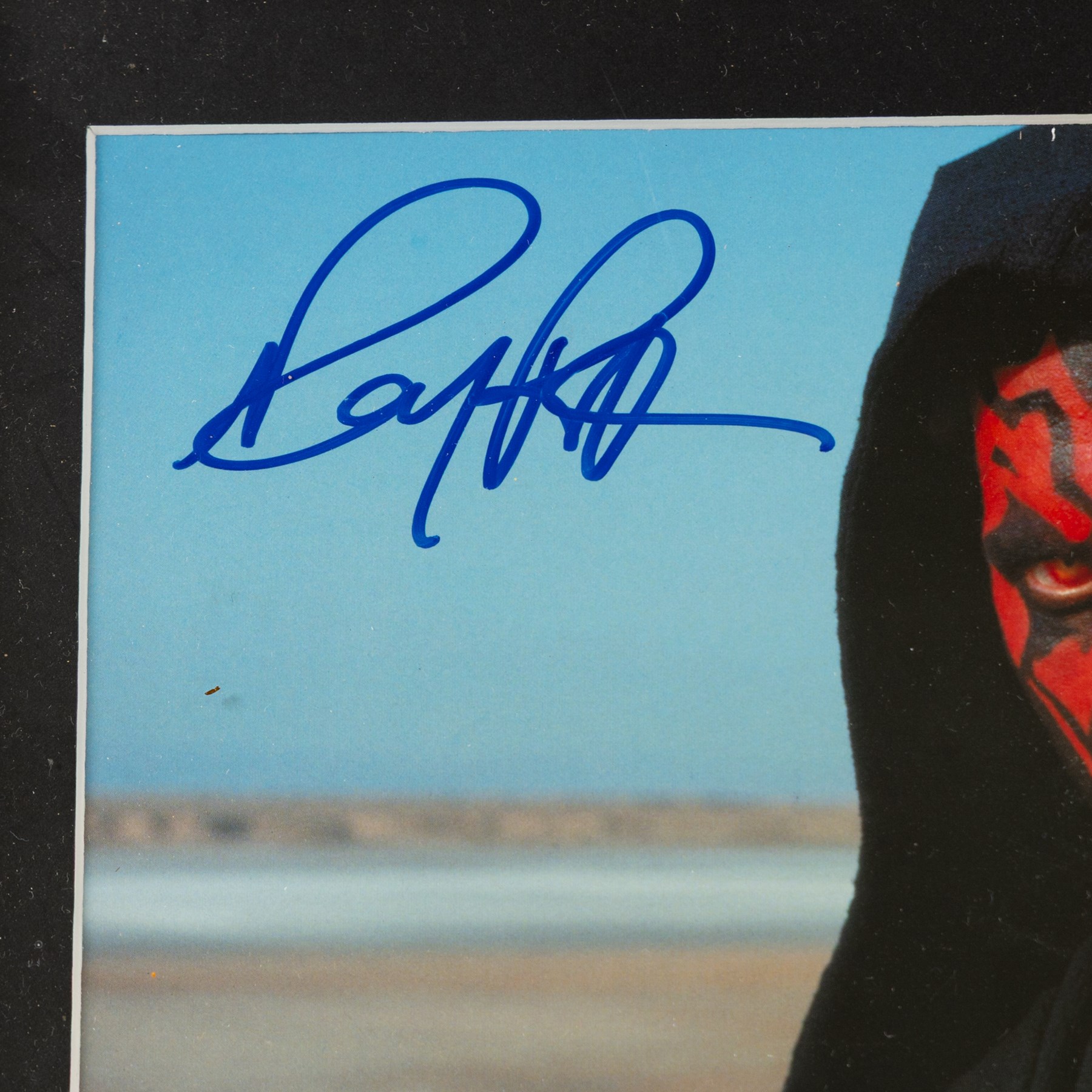 Signed Star Wars prints, comprising Rogue One Cineworld poster signed by Spencer Wilding (Darth Vader), portrait of Lando Calrissian signed by Billy Dee Williams, still of Boba Fett and Jango Fett signed by Daniel Logan and Temuera Morrison and a still of Darth Maul signed by Ray Park, R2-D2 signed by Kenny Baker and a C-3PO montage signed by Anthony Daniels, all framed 